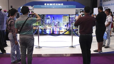 Samsung unveils its 85-inch ultra-high-definition curved-screen TV at Gitex Shopper in Dubai. Lee Hoagland / The National