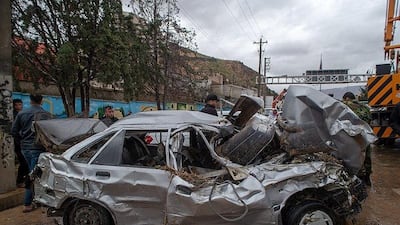 Damaged vehicles are seen after a flash flooding In Shiraz. Reuters
