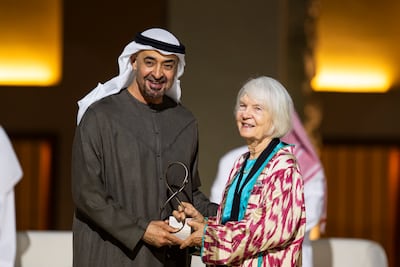 President Sheikh Mohamed with Dr Frauke Heard-Bey, who received an Abu Dhabi Award on behalf of her late husband, David Heard, at Qasr Al Hosn. Photo: UAE Presidential Court