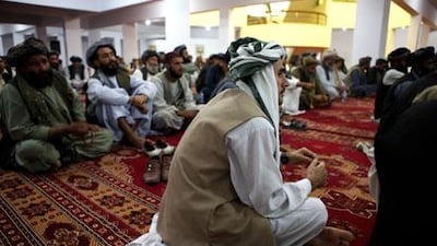 Elders from within Kandahar City and its outer districts gather on April 28 to celebrate Mujahedeen Day.