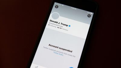 The suspended Twitter account of US President Donald Trump on a smartphone in Washington, on January 9, 2021. Bloomberg