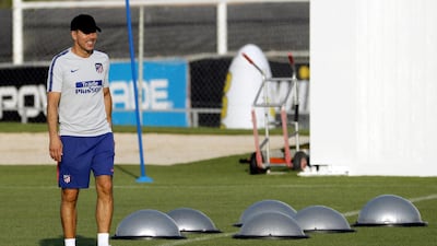 Diego Simeone leads a training session ahead of Atletico Madrid's season-opening match against Valencia. EPA
