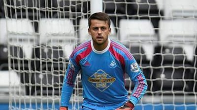 Swansea City will be Manchester United’s first league opponents under new manager Louis van Gaal, but Swans goalkeeper Lukasz Fabianski has warned there is no danger of Swansea allowing the Dutchman a gentle introduction. (Photo by Tom Dulat/Getty Images)