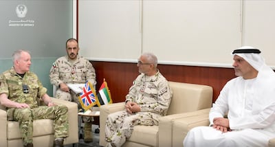 The UK's Chief of the Defence Staff Richard Knighton, left, with UAE Armed Forces counterparts. Photo: UAE MOD