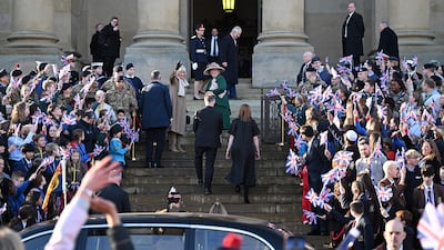 The king and Queen Consort Camilla arrive at Bolton Town Hall. AFP