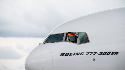 The airplane carrying Sheikh Mohamed arrives at Brandenburg Airport, displaying UAE and German flags