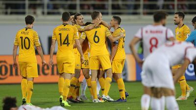 Syria players are dejected following Tomas Rogic's late winning goal for Australia. Getty Images