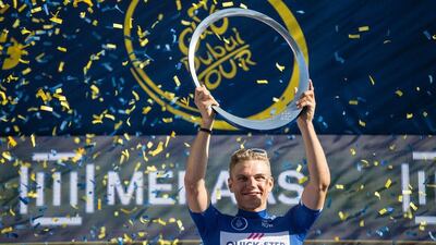 Marcel Kittel lifts the Circle of Stars trophy after winning the 2017 Dubai Tour. Mahmoud Khaled / AFP