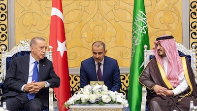Mr Erdogan is received by the Deputy Governor of Makkah province, Prince Badr bin Sultan, on his arrival in Jeddah. AFP