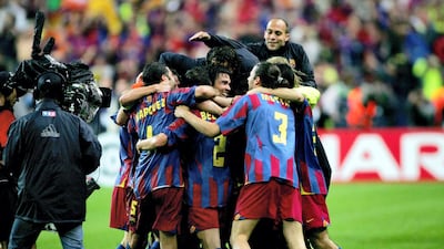 Barcelona players and staff celebrate after beating Arsenal. Getty