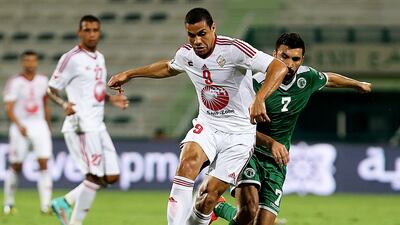 Monterio Wanderley, left, scored twice for Sharjah but it was not enough to offset Al Shabab’s barrage. Satish Kumar / The National