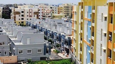 Newly constructed residential apartments lie vacant on the outskirts of Hyderabad. Noah Seelam / AFP