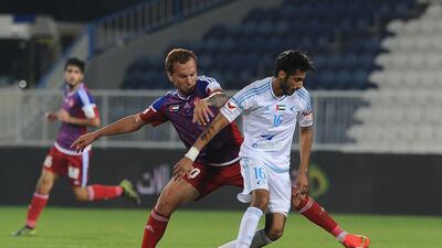 Fawaz Awana, right, and his Baniyas were held to a draw at home by a tenacious Al Shaab side. Abdullateef Al Marzouqi / Al Ittihad