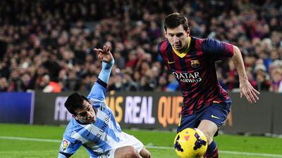 Lionel Messi played a role in two of Barcelona's goals on Sunday. Josep Lago / AFP