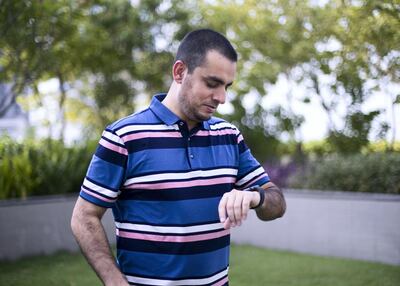 Asad Khattak, pictured, is working on research about smartwatches, which he believes will soon be used as monitoring devices by doctors to prevent falls before they happen. Reem Mohammed / The National