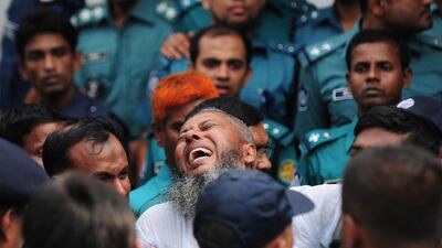 A Bangladeshi soldier following the announcement of his death penalty at a special court in Dhaka. The court sentenced at least 150 soldiers to death and jailed hundreds more over a 2009 military mutiny that left scores of top officers massacred. Munir uz Zaman / AFP