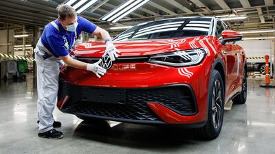 A factory worker assembles a Volkswagen ID.5 electric car in Zwickau, Germany. Getty