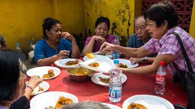 Pilgrims bond over a hearty feast
