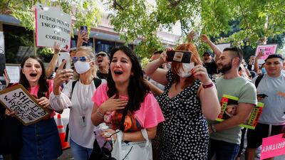 There was cheering and tears of happiness among the rallying supporters outside the courthouse. Reuters