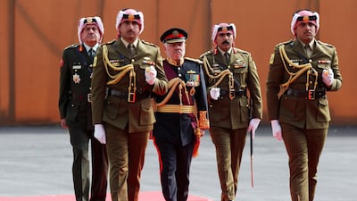 Jordan's King Abdullah reviews the honour guard during the opening ceremony of the fourth ordinary session of the 18th Parliament in Amman, Jordan. REUTERS
