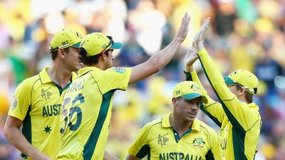 Australian players celebrate the final wicket of New Zealand's innings at the Melbourne Cricket Ground. Getty Images