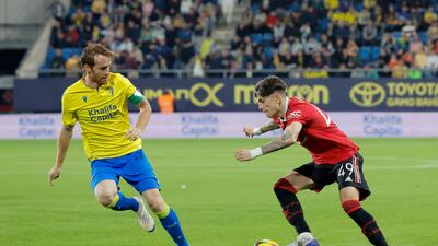 Cadiz's Alex Fernandez with Manchester United's Alejandro Garnacho. Reuters