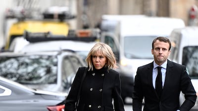 Brigitte, wearing a black coat, at the Paris funeral of French businessman Henry Hermand, on November 10, 2016. AFP