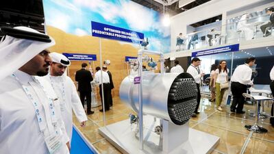 Delegates view the Emerson display at Adipec. Christopher Pike / The National