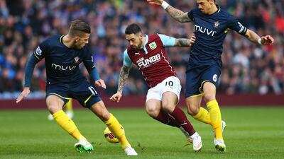 Danny Ings of Burnley is closed down by Jose Fonte and Toby Alderweireld of Southampton during their Premier League match on Saturday. Alex Livesey / Getty Images