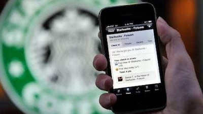 An iPhone with a Foursquare display.