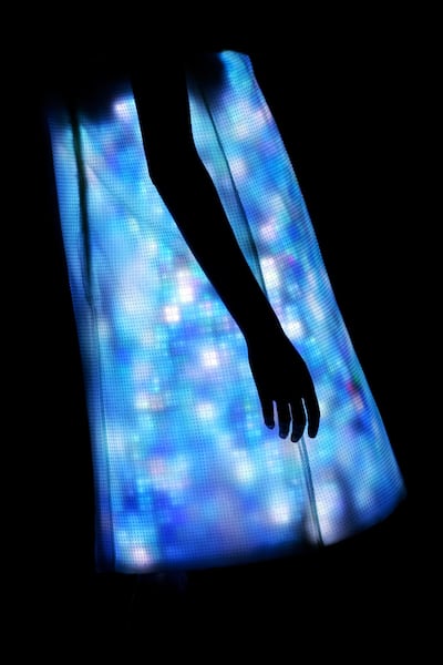 A model presents a creation by British-based Turkish Cypriot designer Hussein Chalayan during the Autumn/Winter 2007/2008 ready-to-wear collection show in Paris, 28 February 2007. AFP