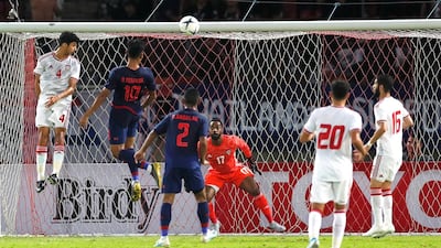 Thailand's Teerasil Dangda, second right, scores the opening goal. EPA