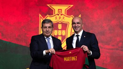 New Portugal manager Roberto Martinez alongside FPF president Fernando Gomez after the Spaniard's unveiling. AFP