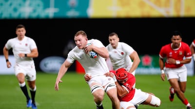 England's Sam Underhill in action with Tonga's Sione Kalamafoni at the Sapporo Dome in Japan. Reuters