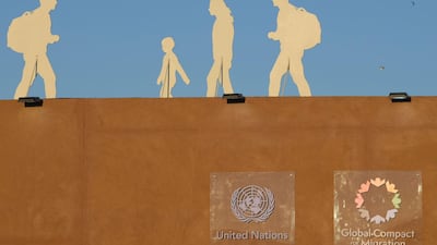 Silhouettes of migrants are installed at the grounds of the International conference on Global Compact for Migration in Marrakech. AFP