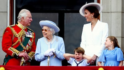 Queen Elizabeth II, Prince Charles and Kate, Duchess of Cambridge, along with Princess Charlotte and Prince Louis on the balcony of Buckingham Palace, to view the platinum jubilee flypast. Taken by Hannah McKay. Reuters/PA