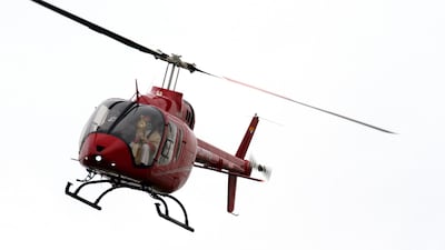Guayaquil's auxiliary bishop Giovanni Battista Piccioli blesses the Ecuadorian city from a helicopter. AFP