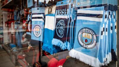 Manchester City scarves on sale in a Manchester souvenir shop. Darren Robinson for The National