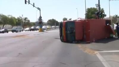 Emergency services were called into action after a lorry overturned on an Abu Dhabi Road.