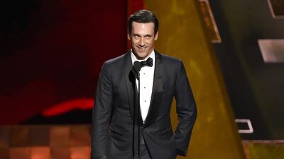 Jon Hamm accepts the award for outstanding lead actor in a drama series for Mad Men at the 67th Primetime Emmy Awards on Sunday, September 20, 2015. AP
