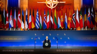 Mr Biden announces new air defence systems for Ukraine at the 75th anniversary event. Bloomberg