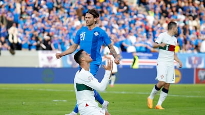 Portugal's Cristiano Ronaldo reacts after missed a chance. AP Photo