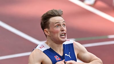 Karsten Warholm of Norway reacts after winning the gold medal in the Men's 400m Hurdles Final during the Tokyo 2020 Olympic Games at Olympic Stadium in Tokyo.
