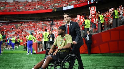 Canada's Ismael Kone is seen in a wheelchair before the match against Switzerland. Reuters