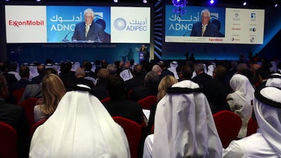 Rex Tillerson, the chief executive of ExxonMobil, speaks at the opening ceremony of Adipec. Nezar Balout / AFP