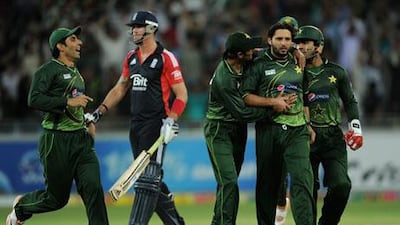 Shahid Afridi celebrates taking the important wicket of Kevin Pietersen in Dubai on Thursday night.