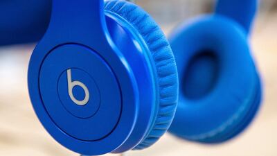 A central part of the deal’s allure is the Beats Music service, which highlights Apple’s seriousness about its own music-subscription service. Andrew Burton / Getty Images / AFP