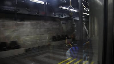 Egyptian women ride past the closed Sadat metro station which runs under Tahrir Square. The Sadat station, a sprawling hub underneath Tahrir Square, has been closed since August 2014 after police violently cleared a pair of public sit-ins by supporters of ousted Islamist President Mohammed Morsi. The closure has added up to 40 minutes to the daily commutes of many Metro riders.