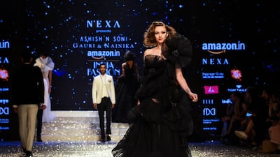 Gauri & Nainika Karan teamed up with designer Ashish N Soni at the show. Chandan Khanna / AFP