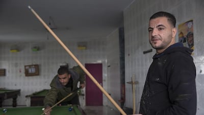 Samer Mohammed,34, a supporter of expelled Fatah leader Mohammed Dahlan, at a pool hall in the Amari refugee camp in the West Bank. He says he was not invited to the Fatah conference beginning on November 29, 2016. Heidi Levine for The National / November 28, 2016